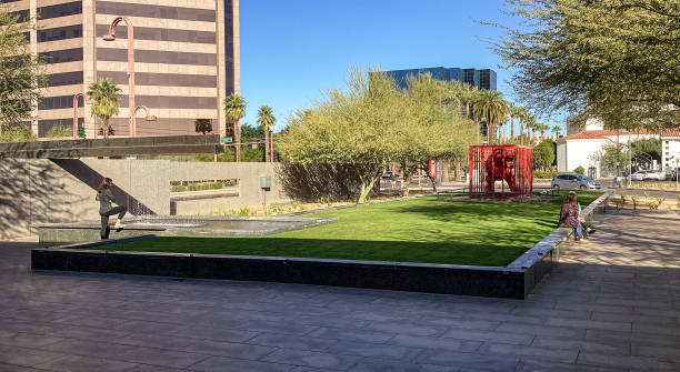 Front Garden and Fountain of the Phoenix Art Museum, Phoenix, Arizona Phoenix, AZ, USA - December 4, 2021: The Front Garden and Fountain of the Phoenix Art Museum in Phoenix, Arizona greets patrons before entering the museum. Phoenix Art Museum has become the largest art museum in the southwestern United States, providing access to art from all over the world to the people of Arizona. phoenix stone stock pictures, royalty-free photos & images