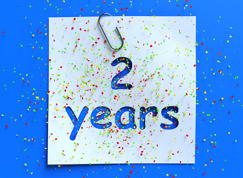 Two years paper confetti sign