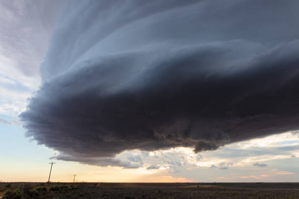 istock Ominous storm clouds over a field 1391121794