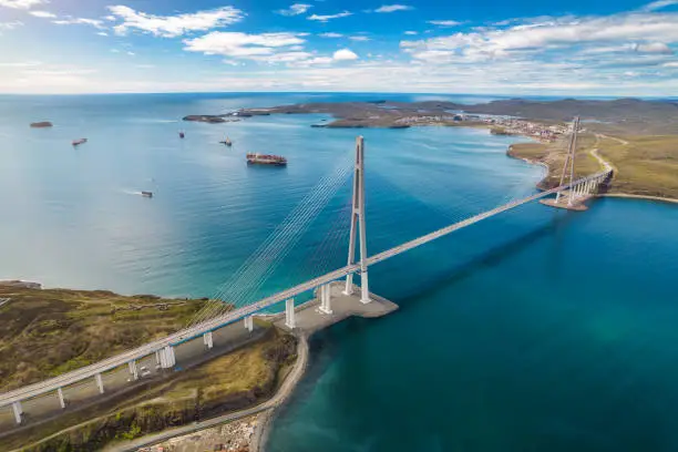 Aerial view of famous cable-stayed bridge to Russky island from Vladivostok city in Far East of Russia