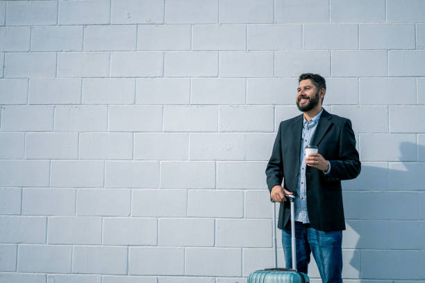 istock Businessman arriving from business trip 1391132737