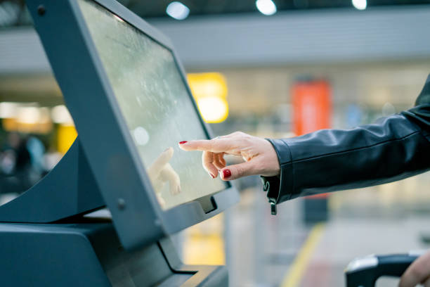 istock Woman at airport check-in 1391132746