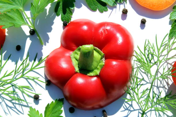 istock Texture from different cut vegetables and red pepper in the middle. 1391147035
