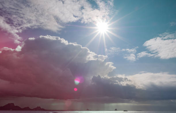 abstract color of the pinky sky and soft warm color clouds in dawn time, sunrise morning over seacoast. skies covered by romantic cirrus clouds, nature landscape background of Samui island in Thailand