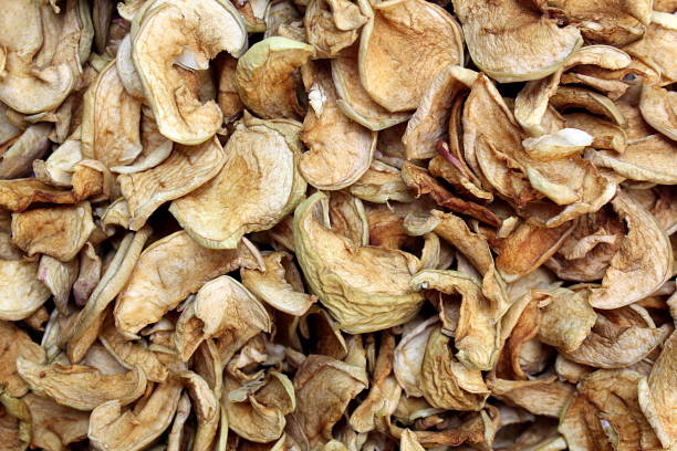 istock Texture from a pile of dry apples for compote. 1391147152