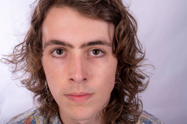 istock Portrait of young man looking at camera 1391153376