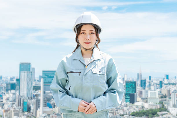 istock Construction workers against the backdrop of the city 1391158725