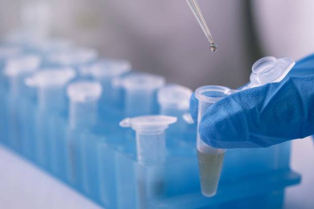istock scientist using auto-pipette with Eppendorf consumables tube in the lab 1391159448
