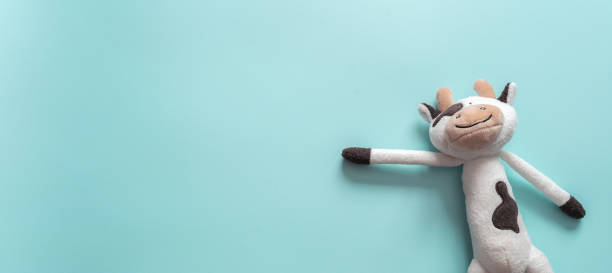 istock funny toy on turquoise background 1391160312