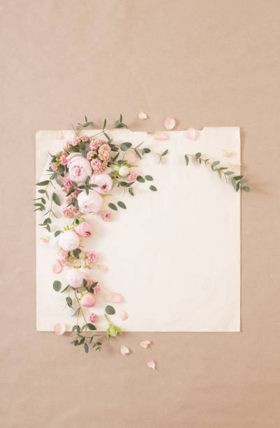 istock beautiful roses on background  old paper 1391160676