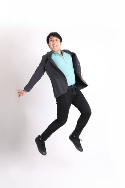 young asian businessman - men businessman jumping levitation imagens e fotografias de stock