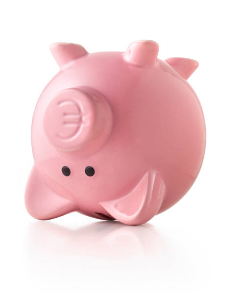 Piggy bank upside down with euro symbol isolated on white background.