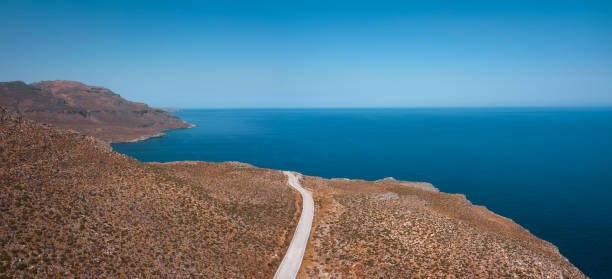 Aerial view on winding mountain road towards Zakros (Sitia, Crete, Greece).