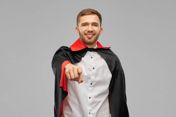 istock man in vampire cape pointing finger to camera 1391161687