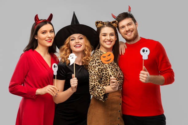 friends in halloween costumes with party props - witch beauty beautiful women imagens e fotografias de stock