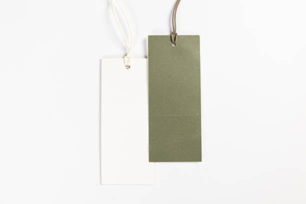 istock two fashionable blank labels for clothes on a gray background 1391163446