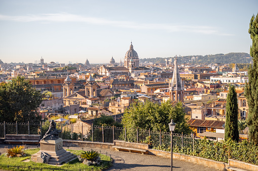 Cityscape of Rome city on a sunny morning. Top view from Borghese park. Skyline of italian city
