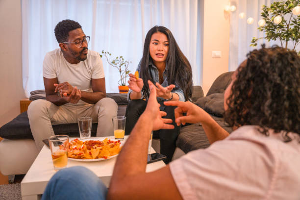 istock Diverse Friends Hanging Out Eating Snacks 1391166927