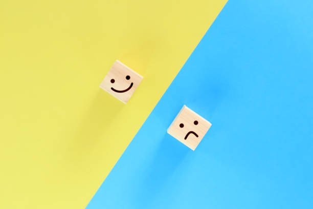 istock Building blocks with good mood and bad mood expressions on them. 1391167793