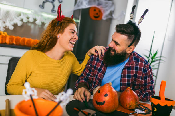 Happy couple on a celebration of Halloween. stock photo