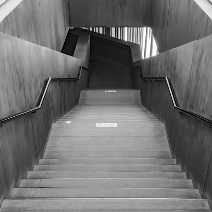 Descending stairs, steps, walkways, industrial style, gray-black