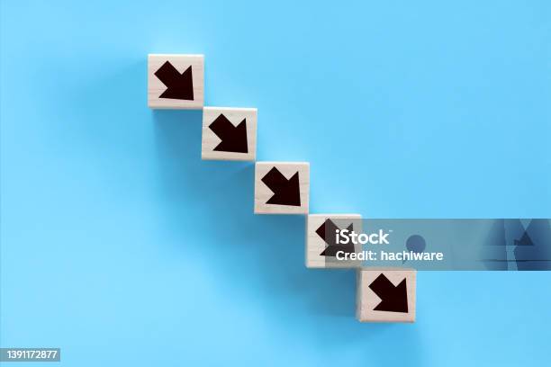 There Is A Stack Of Blocks With Arrows Drawn On Them Stock Photo - Download Image Now