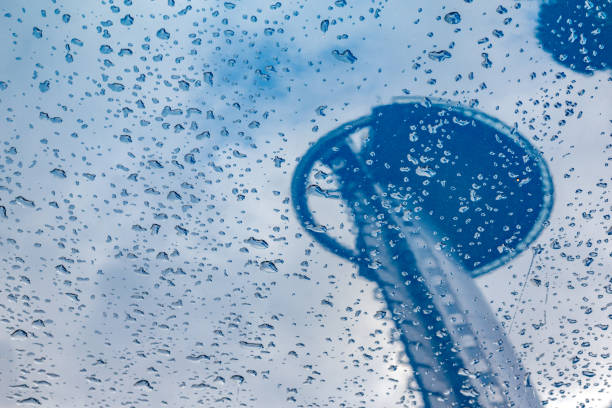 Blue. Raindrops on car body reflecting the moncloa lighthouse in Madrid, Spain. Telecommunications background. Abstract background. Climate. Passing of time. Nostalgia, melancholy Madrid, Spain March 7 2022. Blue. Raindrops on car body reflecting the moncloa lighthouse in Madrid, Spain. Telecommunications background. Abstract background. Climate. Passing of time. Nostalgia, melancholy contemporary madrid european culture travel destinations stock pictures, royalty-free photos & images
