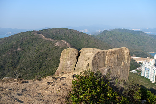 Idyllic panorama from Lo Fu Tau, also known as Tiger's Head, located in the Lantau North Country Park. The hike goes from Tung Chung to Discovery Bay with another path connected to the Olympic Trail which goes from Tung Chung to Mui Wo.