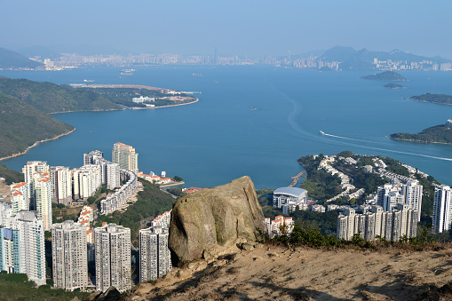 Panorama of Discovery Bay and Hong Kong island from Lo Fu Tau, also known as Tiger's Head, located in the Lantau North Country Park. The hike goes from Tung Chung to Discovery Bay with another path connected to the Olympic Trail which goes from Tung Chung to Mui Wo.