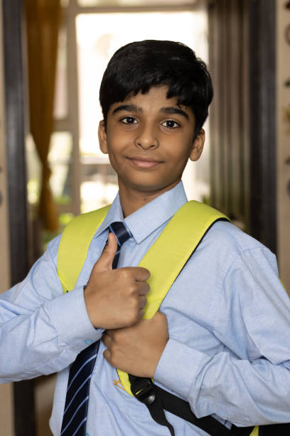 young boy from primary school ready to go to school back to school stock photo