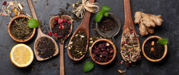 istock Various dried tea in wooden spoons 1391184620