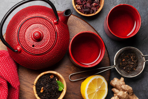 istock Tea with lemon and mint and teapot 1391184704