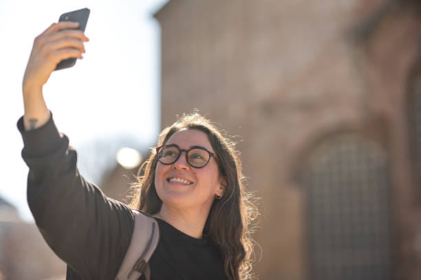 istock Woman taking selfie in sunlight 1391184887