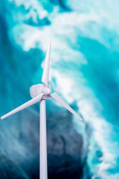 istock Vertical view of windmill on blue sky background. 1391185844