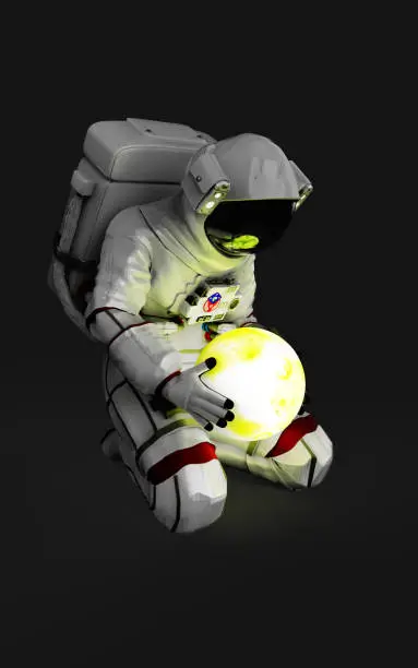 Photo of White astronaut sitting and holding the moon planet with clipping path.