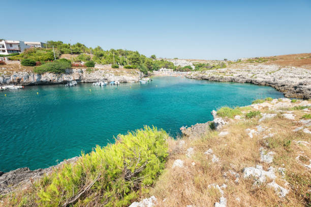 porto badisco, italy, with beatiful colored mediterranean sea - rowboat nautical vessel small motorboat imagens e fotografias de stock