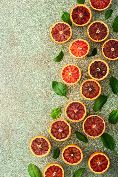 istock Blood orange halves with spinach leaves 1391191047