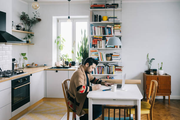 istock Asian man working from home 1391191395