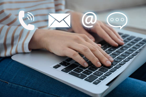 istock Hotline service. Woman working on laptop indoors, closeup 1391192572