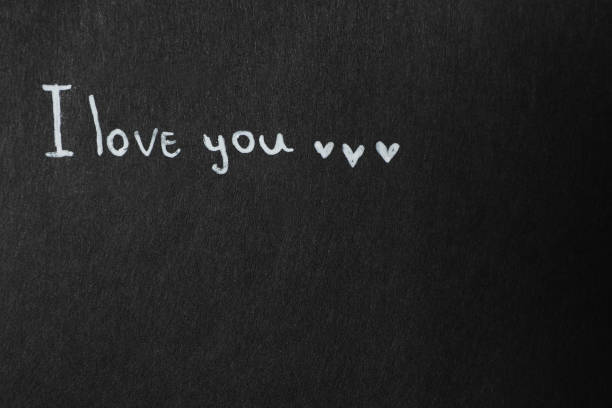 istock Phrase I Love You on black background. Space for text 1391192602