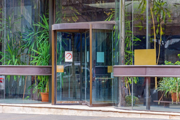 istock Revolving Doors Glass Building 1391198497