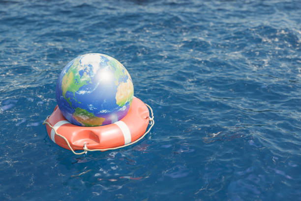 istock Planet floating on rippling sea 1391198603