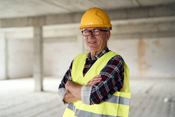 istock Senior Architect With Arms Crossed At Construction Site 1391202672