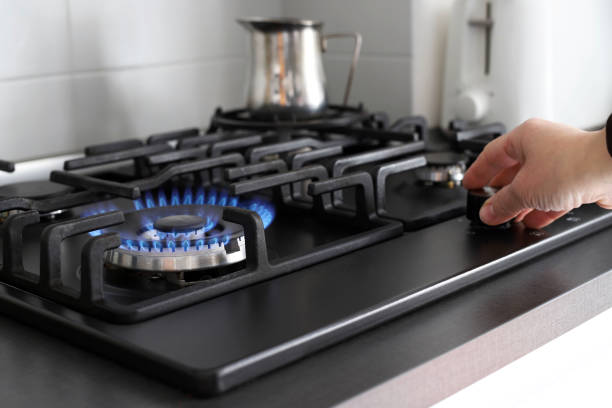 istock Gas crisis. Blue fire from the kitchen hob. 1391204842