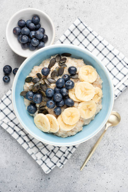 istock Oatmeal bowl with blueberries and banana 1391204848