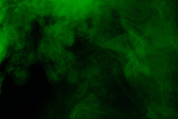 istock Green steam on a black background. 1391207437