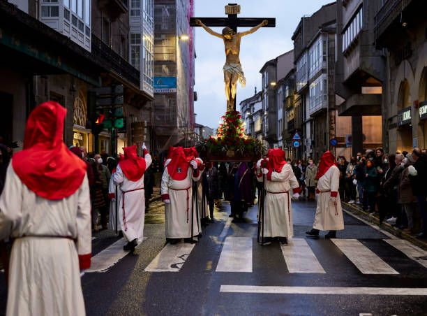 Holy Week Santiago de Compostela, Spain (April 12, 2022).  Is one of the most solemn celebrations in Spain. The Nazarenes or brotherhoods walk the streets hooded with hoods carrying religious images snake hood stock pictures, royalty-free photos & images