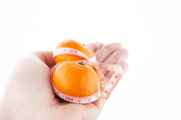 image of mandarin hand white background studio