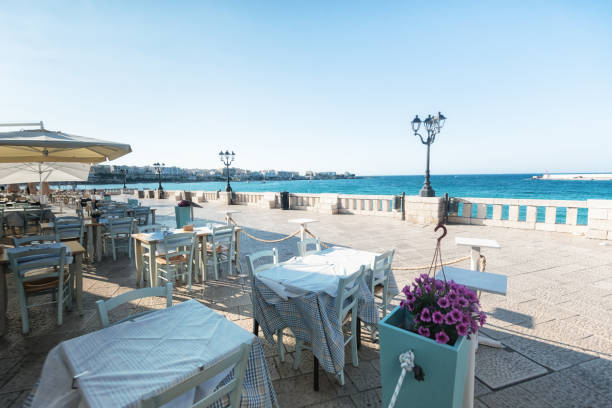 istock Restaurant at waterfront in Otranto, Italy 1391212809