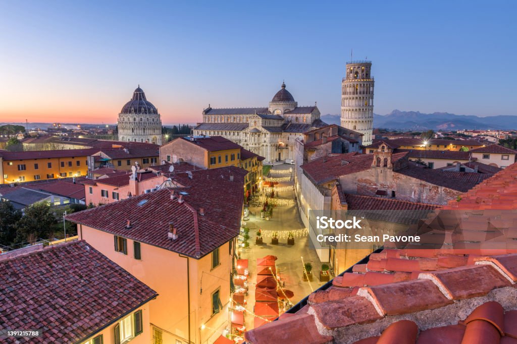 Pisa, Italy with the Duomo and Leaning Tower Pisa, Italy with the Duomo and Leaning Tower at dusk. Pisa Stock Photo